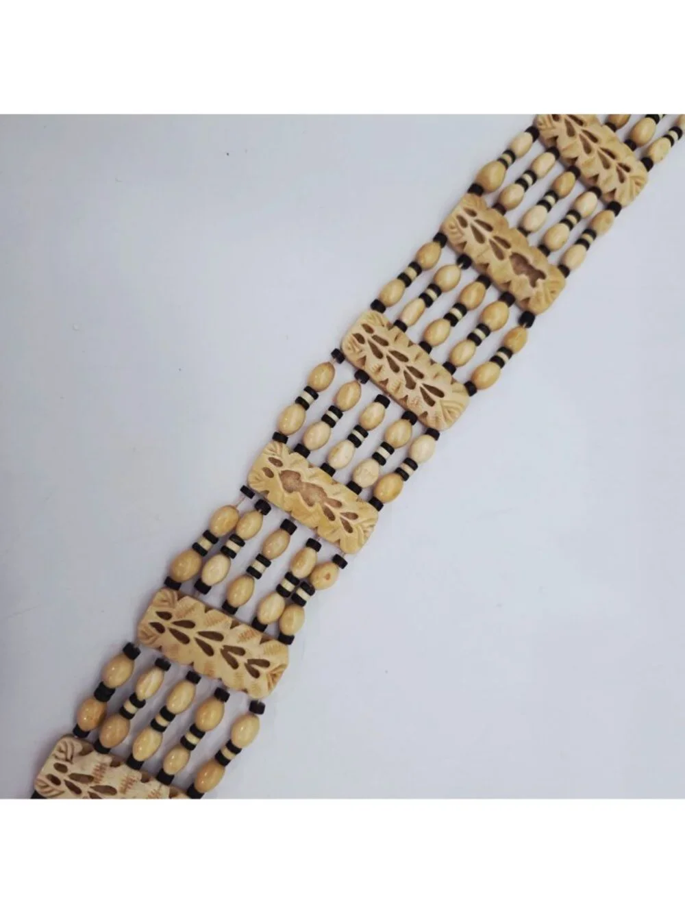 Hand-Carved Bone Beaded Belt With Intricate Leaf Pattern & Button Closure